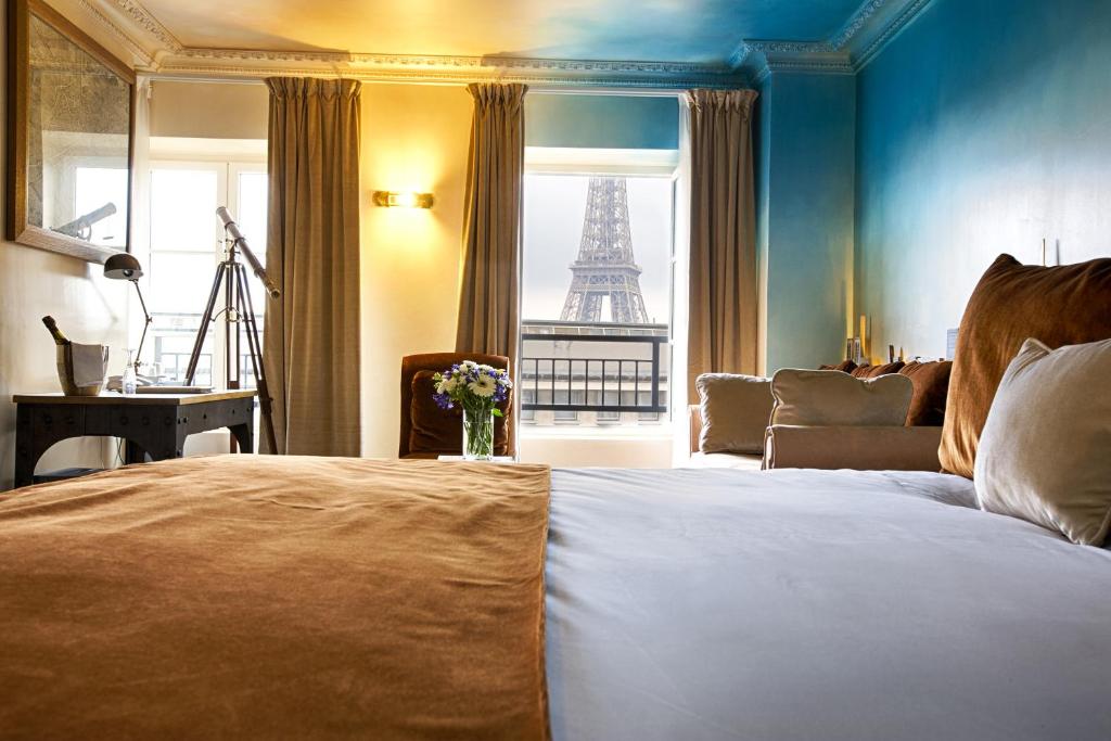 A beuatiful room in one of the boutique hotels in Paris. You can see the Effiel Tower out the window and there is a telescope to view in. 
