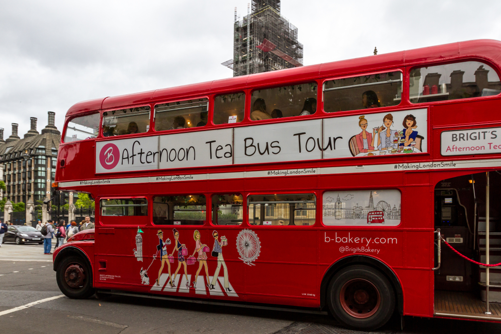  Iconic double decker bus touring Westminster with Big Ben in the Background. You can have a childrens afternoon tea on board. 