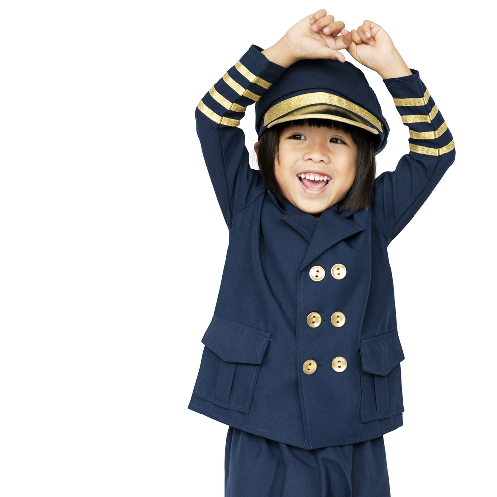 Little boy with pilot dream job smiling he is in a uniform 
