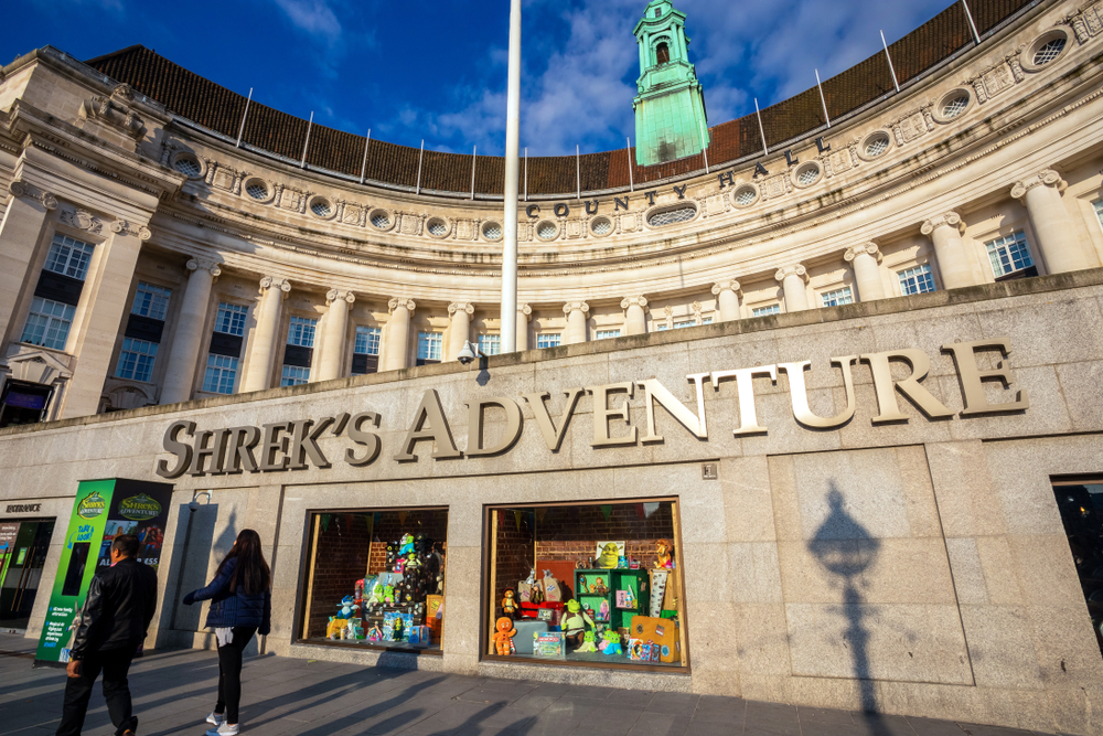 Shrek’s Adventure is a family-friendly attraction based on the film "Shrek" with a 4D movie & interactive fairy tale shows. This photo features the outside of the venue. 