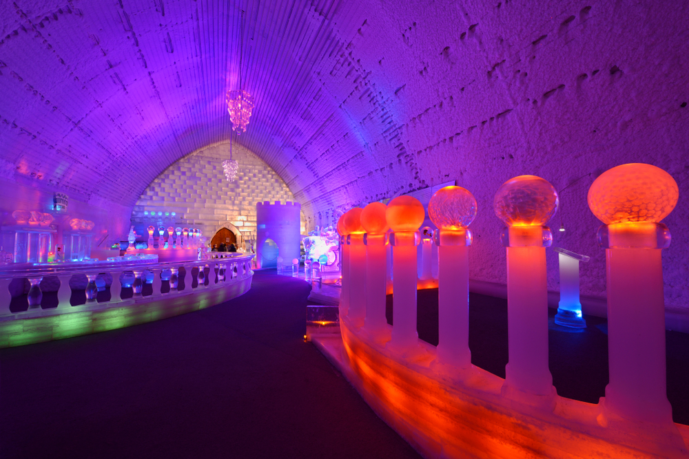 Ice bar at the Aurora Ice Museum. There are ice sculpters in a big ice hall.  