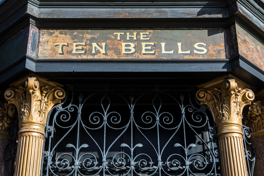 The sign above the entrance to The Ten Bells public house in the Spitalfields area of London. It is famous for its association with two victims of Jack the Ripper.