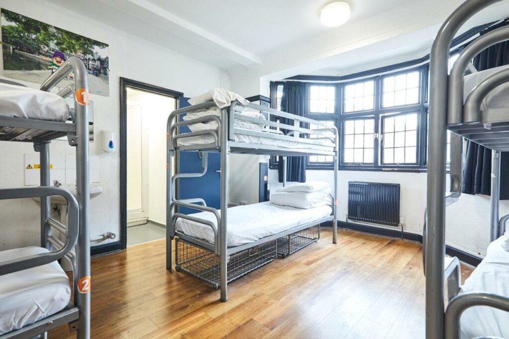 bunk beds with storage facility at the bottom in a room