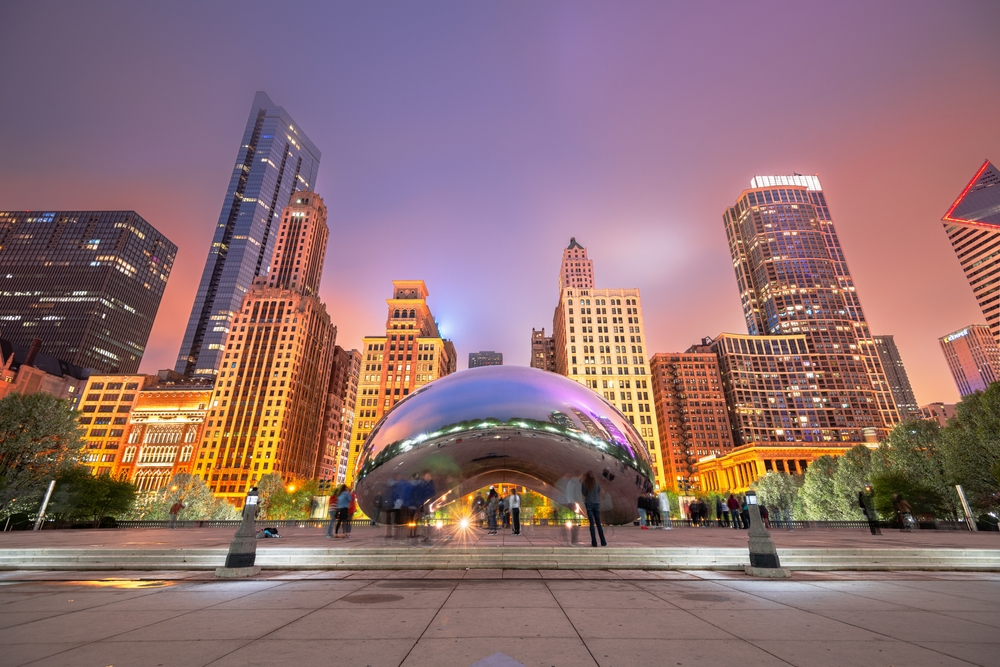 Purple dusk over the Chicago skyline and the metal Bean sculpture.