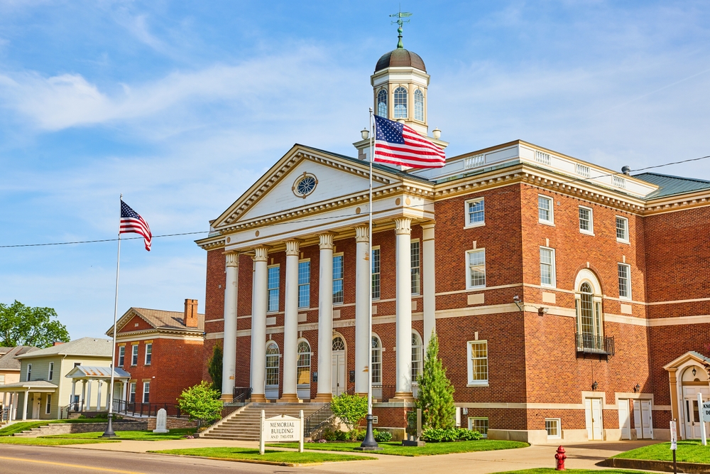 Historic brick building with columns in Mount Vernon, one of the best towns in Ohio.