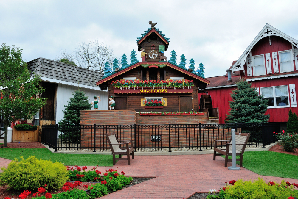Pretty park in Sugarcreek with a wooden cuckoo clock with carved pine trees.