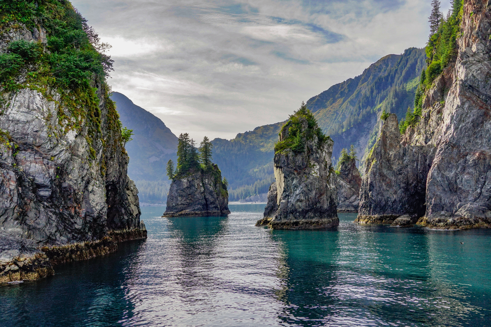 Rock spires in the turquoise water of  Kenai Fjords National Park.