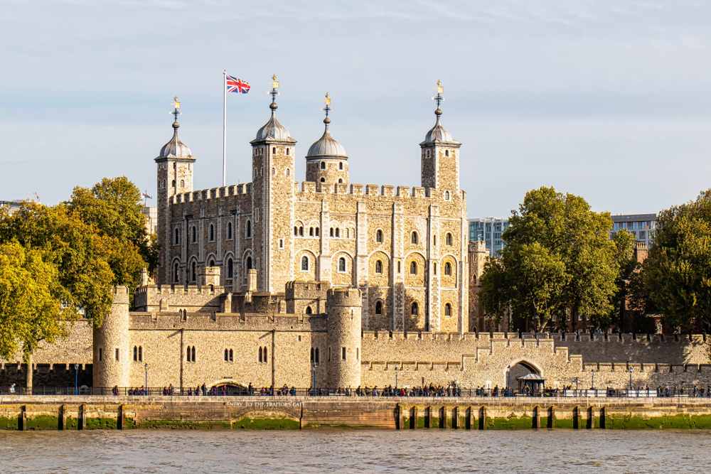Golden hour over the Tower Of London across the river.
