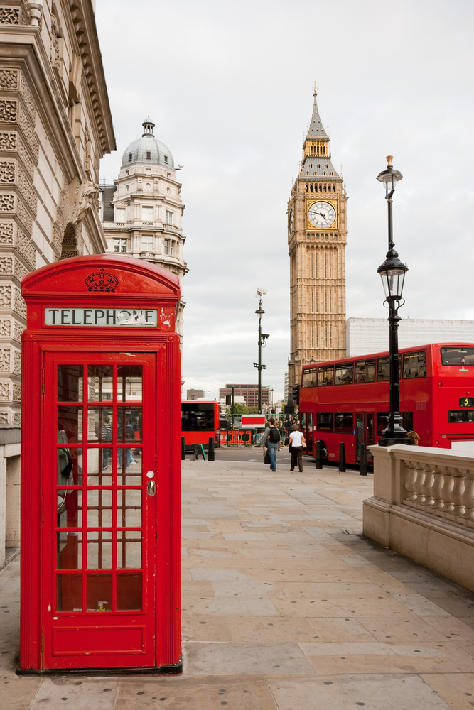 Red telephone box, double decker bus and Big Ben. London, UK. The article is about your first time in London. 