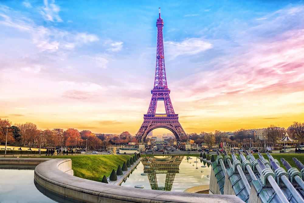 Eiffel tower with colorful sunset sky in background during 4 days in Paris itinerary