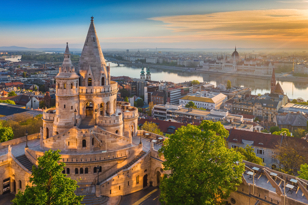 panoramic view of a city with a tower like building one day in budapest