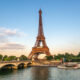 View looking across the river to the sun-kissed Eiffel Tower during one day in Paris.