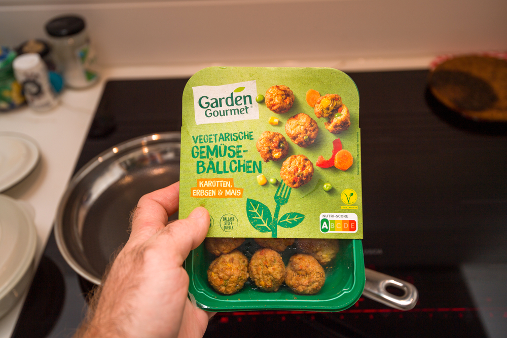 Vegan plant based meat in green container