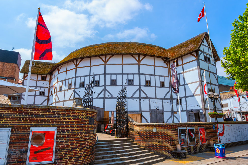 Shakespeare's Globe is a reconstruction of the Globe Theatre, associated with William Shakespeare, in the London. It's a Tudor style round building that is white with wood. 