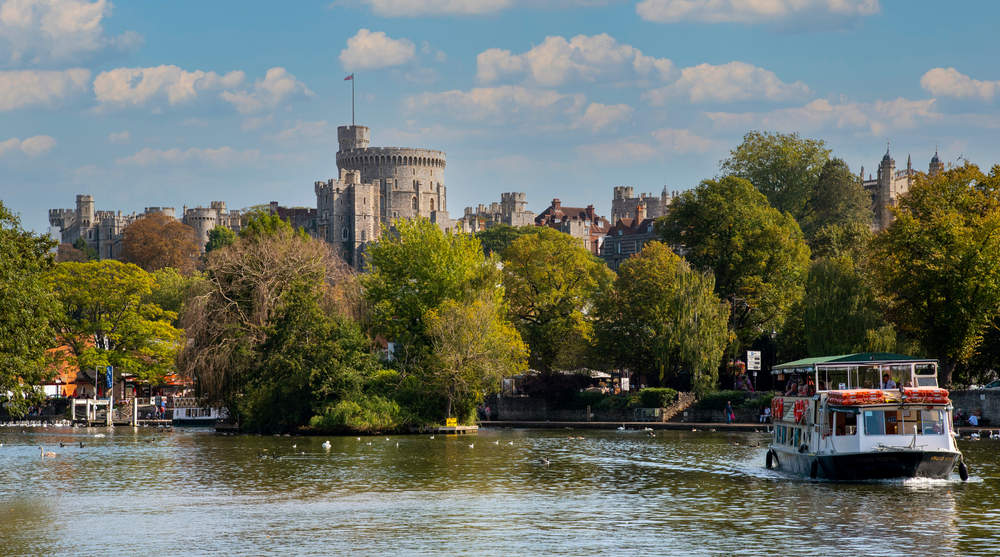  A tourist passenger boat on the River Thames at Windsor. The article is about things to do in Windsor London. 