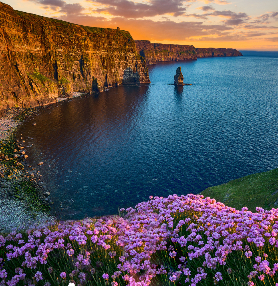 Beatiful sunset from the cliffs of moher in county clare, ireland. the cliffs of moher is one of irelands top tourism attractions aloing the wild atlantic way. One of the 50th birthday trip ideas