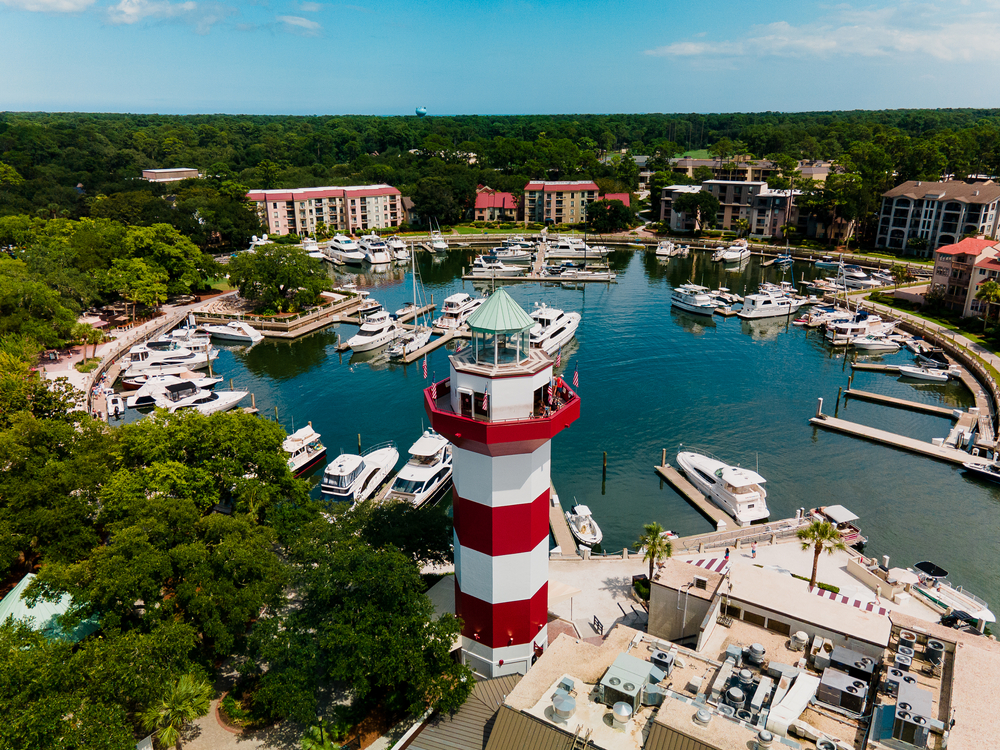 Harbor Town Hilton Head Island South Carolina. You can see a lighthouse, houses and boats. 