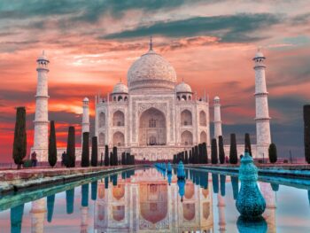 iconic white marble building with sunrise sky in background