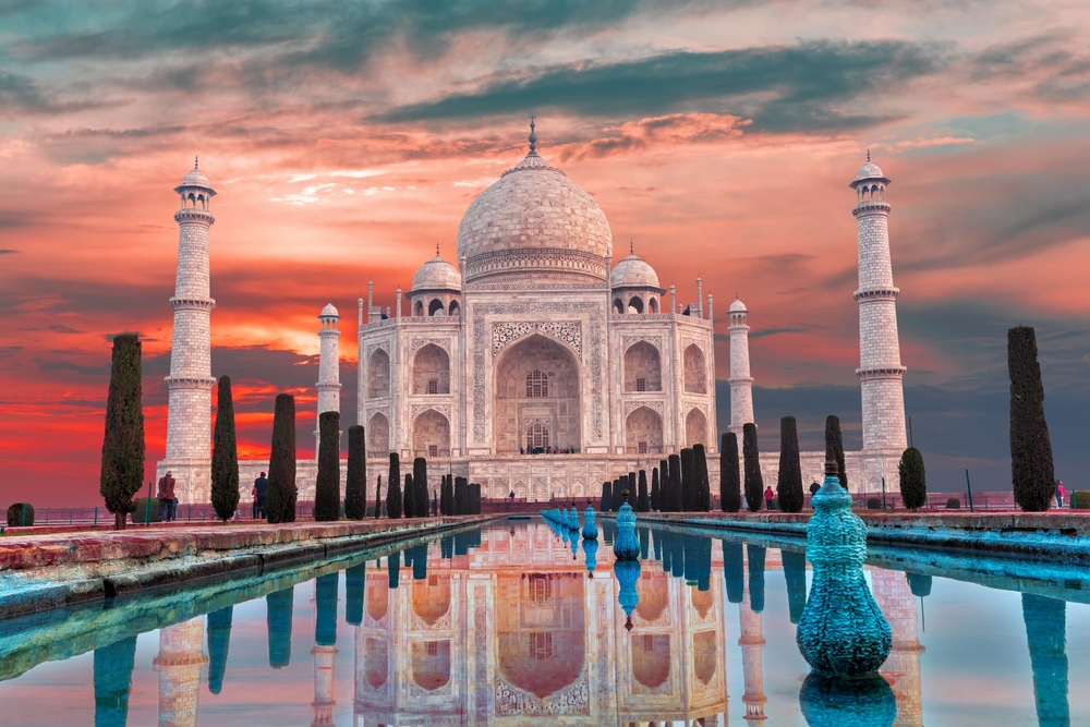 iconic white marble building with sunrise sky in background