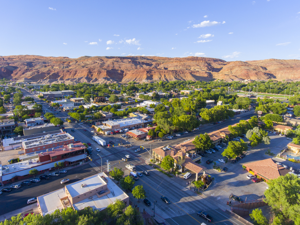 Moab city center and historic buildings aerial view in summer. One of the cities to visit in America.