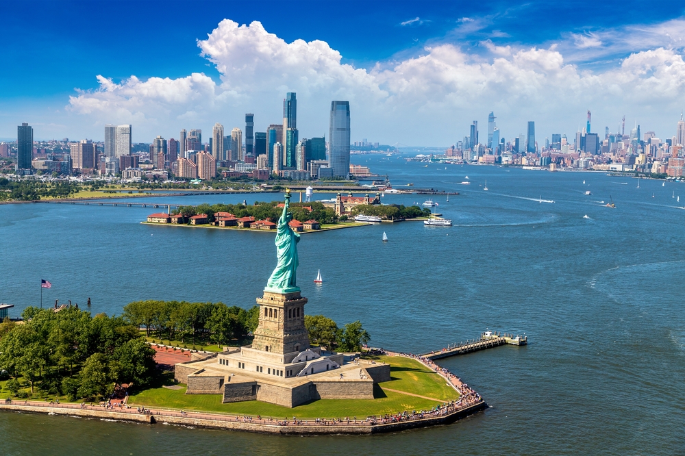 Panoramic aerial view Statue of Liberty and Jersey City and Manhattan cityscape in New York City,