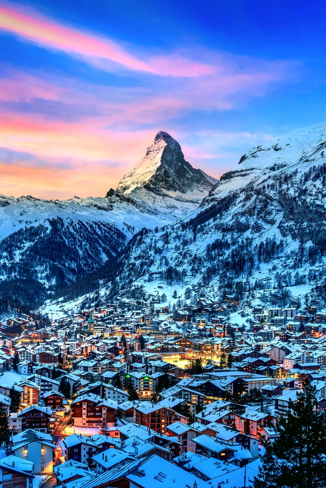 Matterhorn mountain and swiss alps at sunrise in Zermatt, Switzerland. You can see the town. 