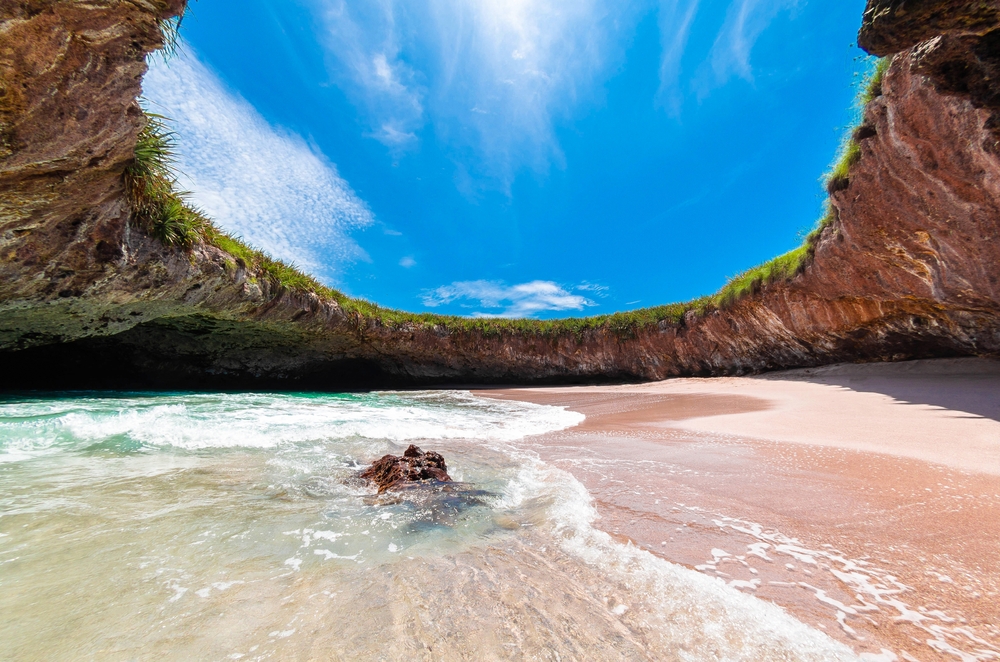 Hidden beach Marieta Island Mexico. The beach has a circle cave around it. 