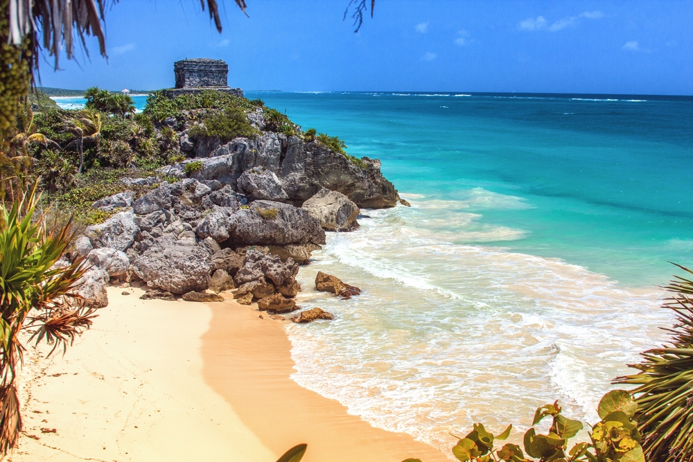 Photo taken in Tulum, Mexico you can see the beach and the fort 