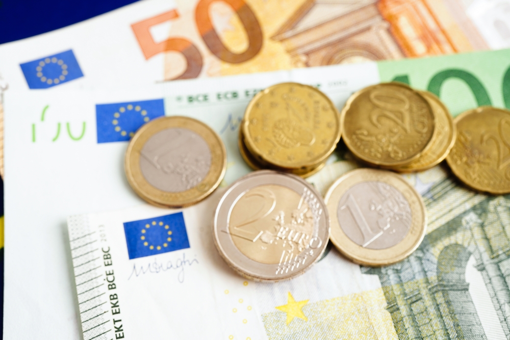 Close up of Euros notes and coins. 