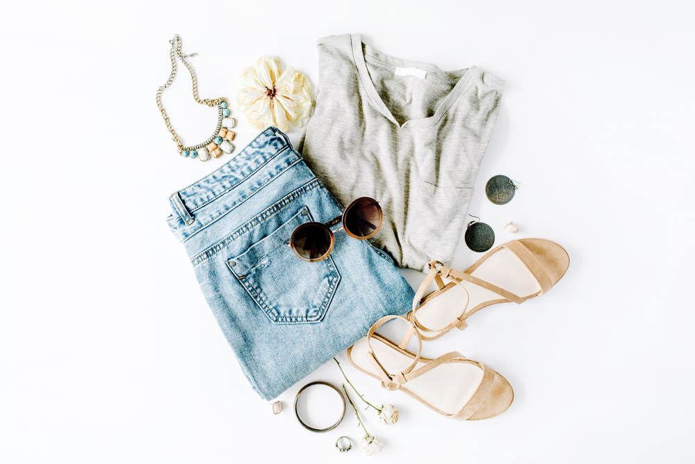 Flat lay photo of a spring outfits with accessories.