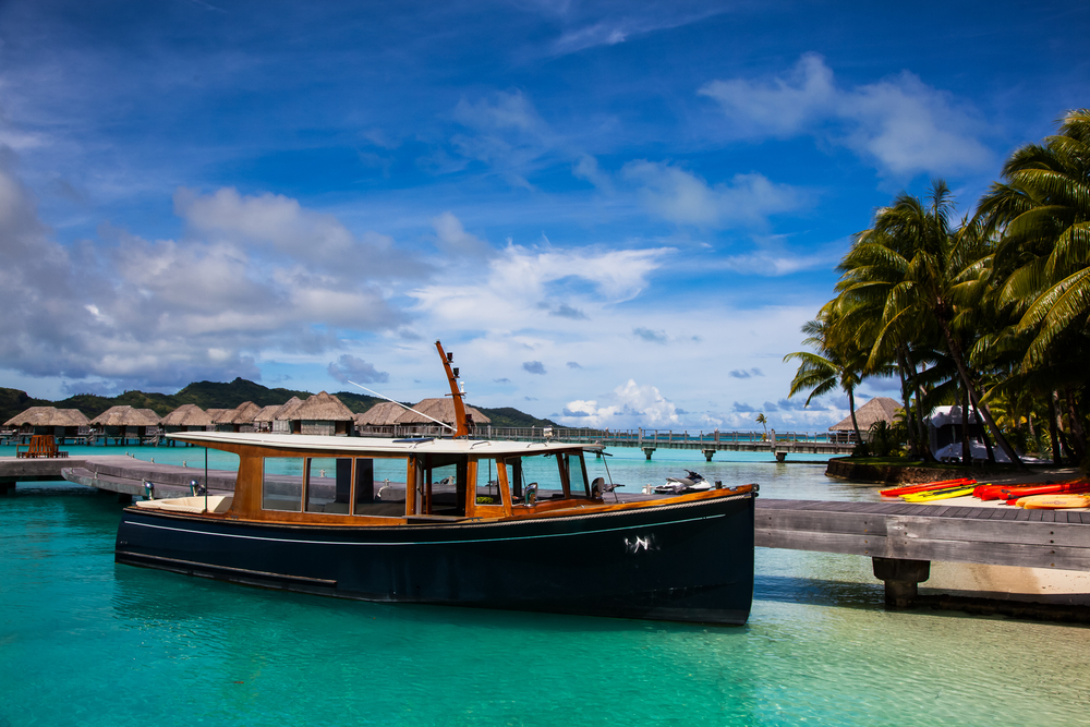 A boat docked at a resort in Bora Bora.