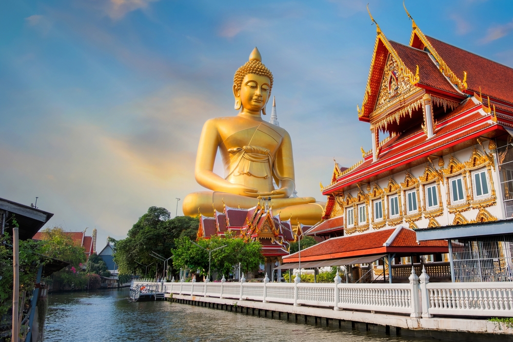 Giant golden Buddha statue at the Wat Paknam Phasi Charoen temple.