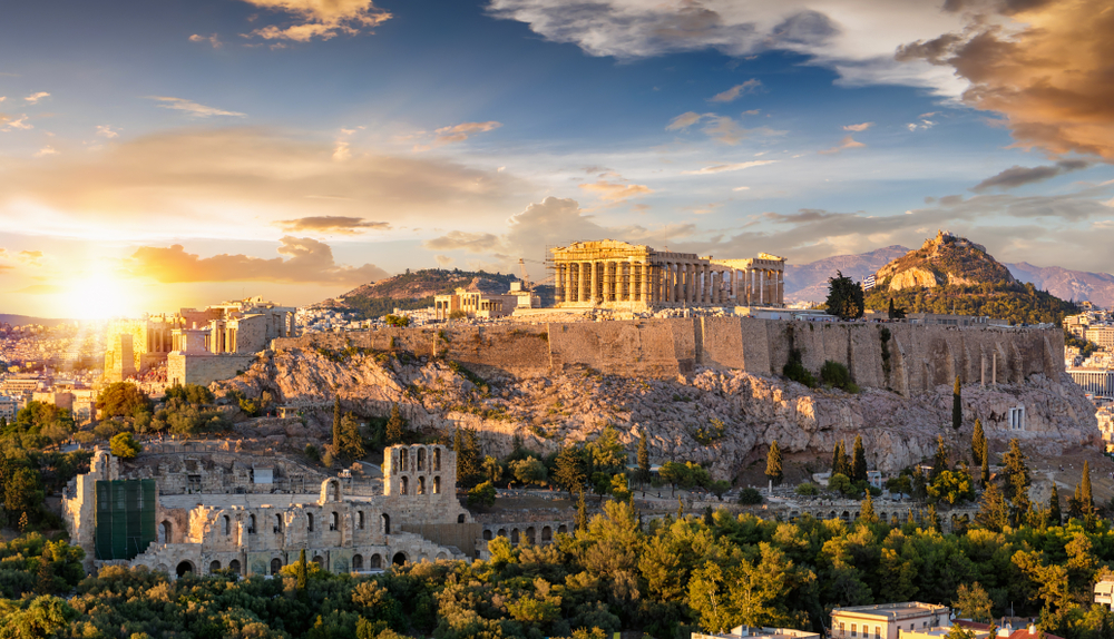 historical ruins on a hill and surrounding it things to do in athens