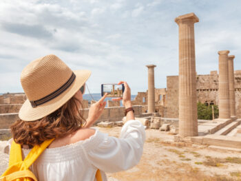girl clicking photos of the historical building tours in athens