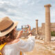 girl clicking photos of the historical building tours in athens