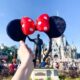 minnie mouse headband in front of the disney castle