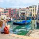 girl sitting on a harbour enjoying the city views and boat view traveling to italy