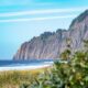 beach surrounded by cliffs