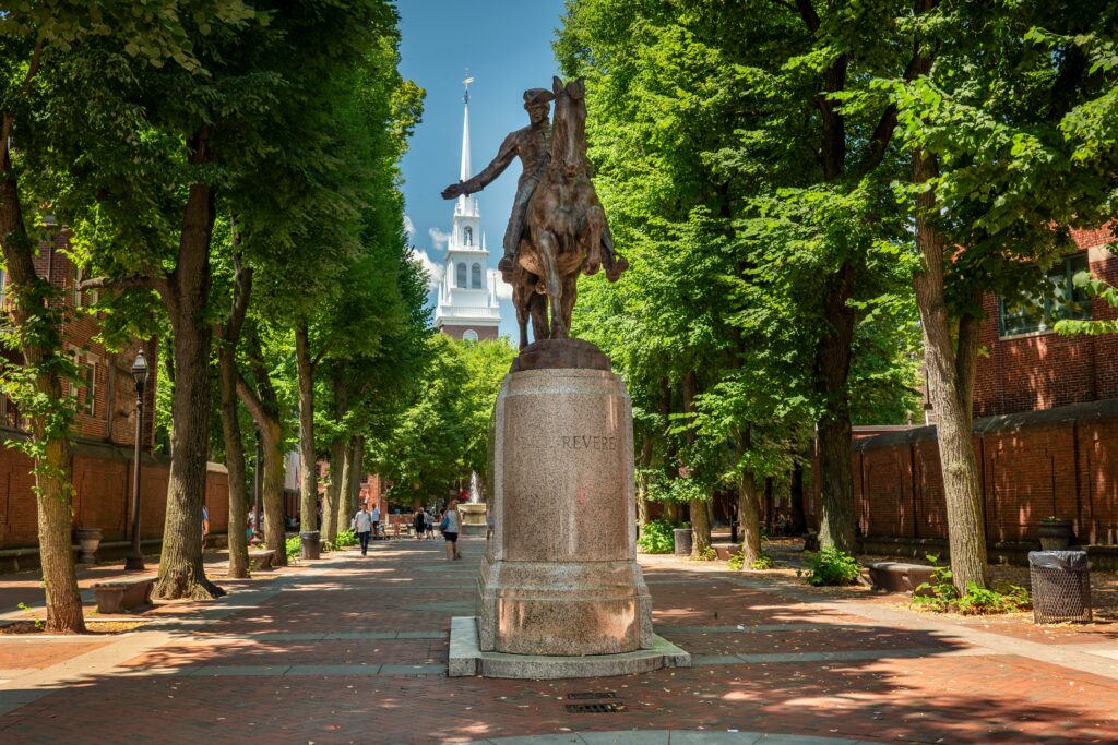 Boston Massachusetts Paul Revere Statue Old North Church Freedom Trail. The article is about a revolutionary road trip. 