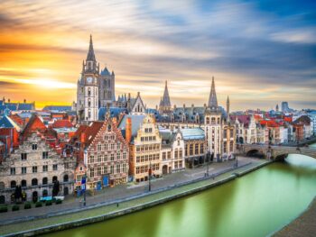 flemish buildings beside a canal cities in belgium