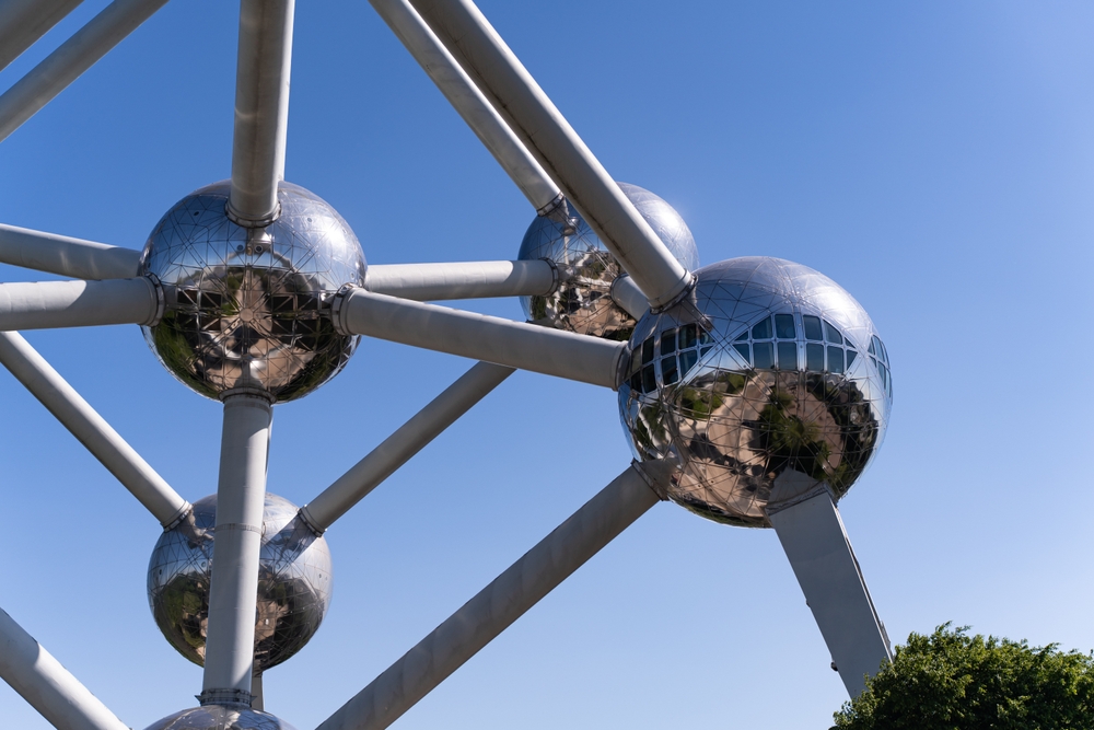 Atomium, Brussel, Europe, Sculpture, Metal. Showing large balls connected together.  The article is about  traveling to Brussels. 