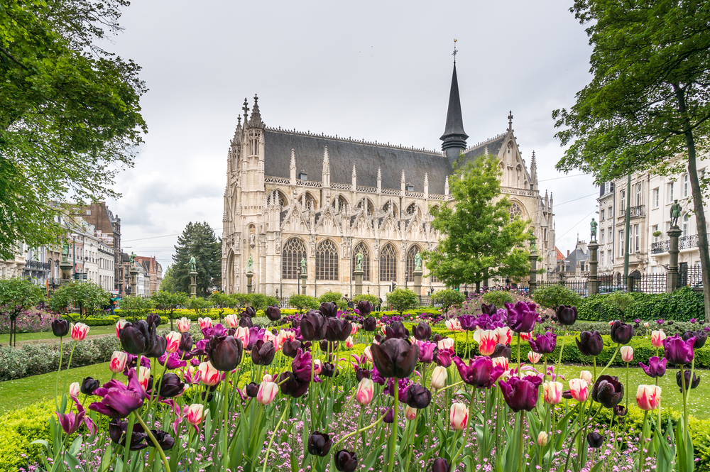 Beautiful tulips in Place du Petit Sablon in front of a church.   to look for when traveling to Belgium