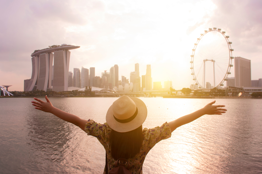 woman enjoying view of the marina bay when traveling to singapore