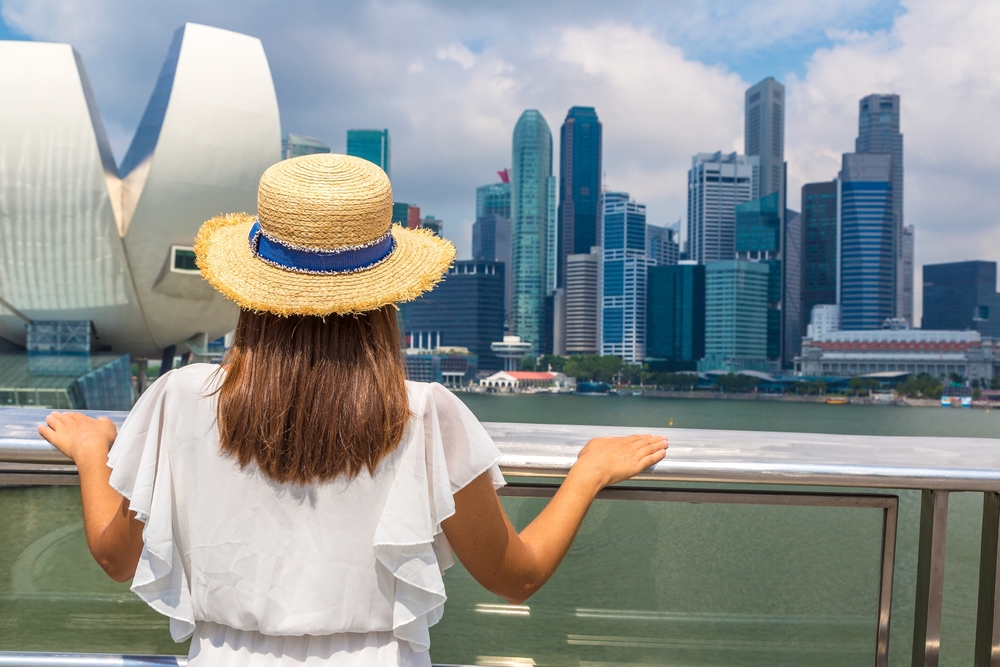 woman looking at the city traveling to singapore