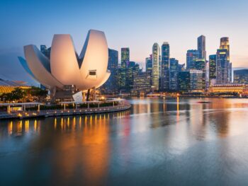 city skyline during sunset traveling to singapore