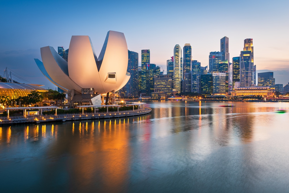 city skyline during sunset traveling to singapore