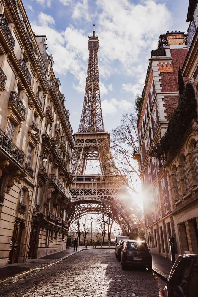 he view of Eiffel Tower during the golden hour from a Paris Street. The article is about the best views in Paris.