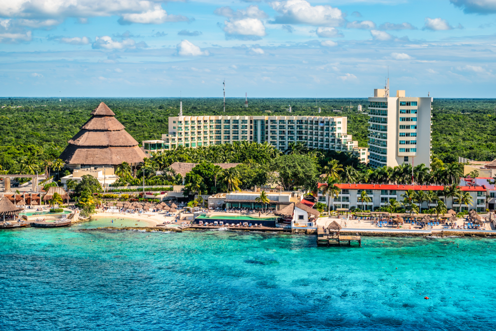 view of the beach with lots of resorts