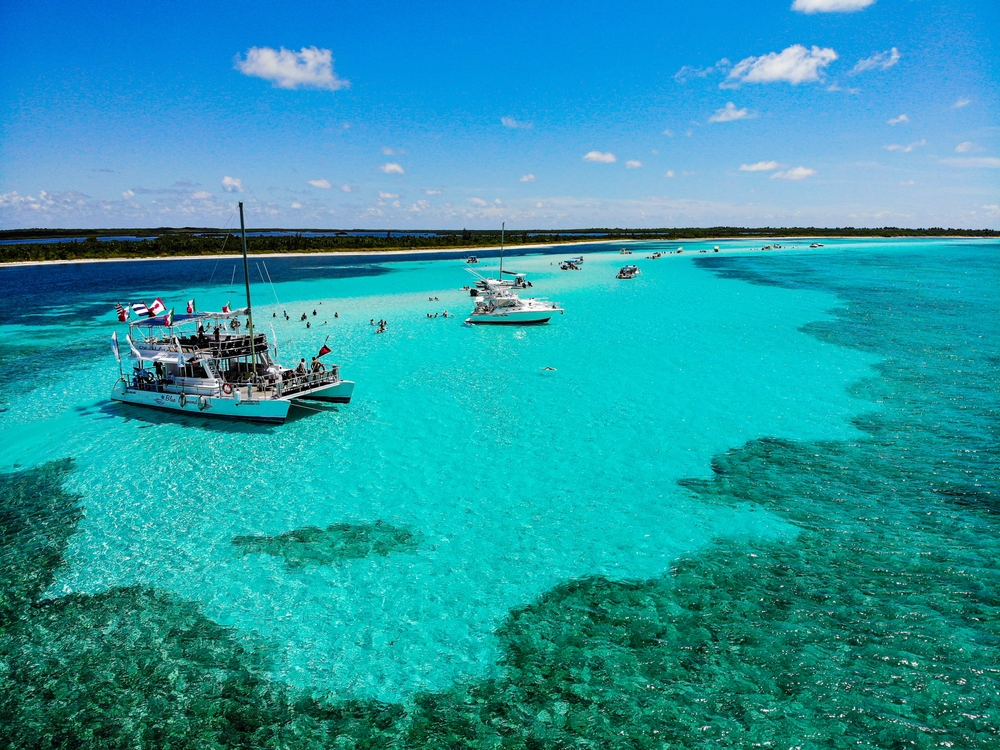 cataraman ships in ocean near island
