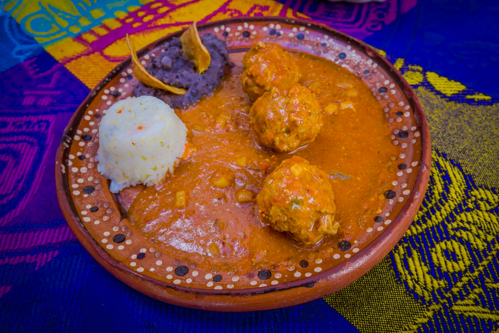 traditional mexican food on a plate cozumel travel tips